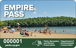 Text: Empire Pass. Image: Empire Pass card with photo of beach.