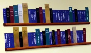 Wall with donor name plates designed to look like a book shelf